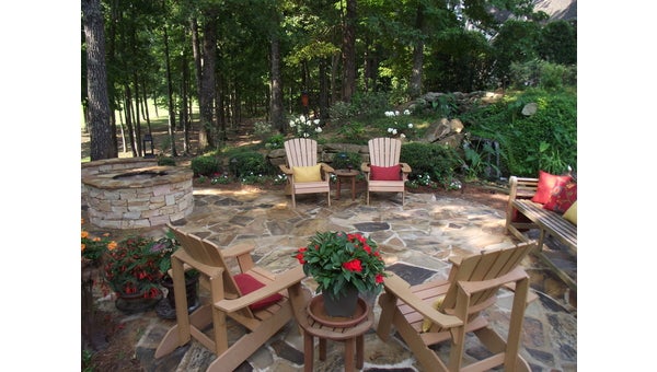 Outdoor Living Areas constructs features like fireplaces, walls and patios to transform clients’ yards.