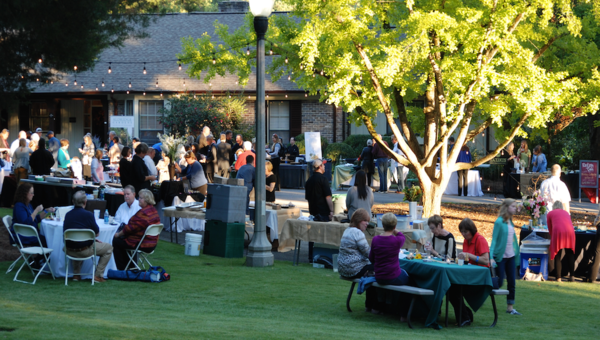 People can relax and socialize while enjoying food from around town.
